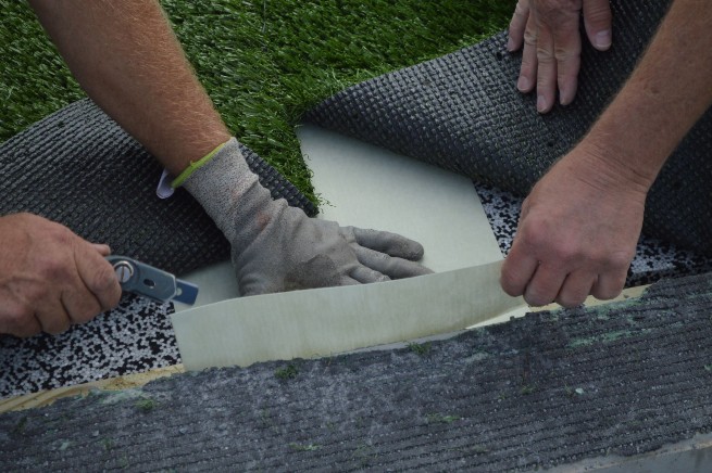 Detroit and all of Michigan artificial turf installation - cushion pad installation